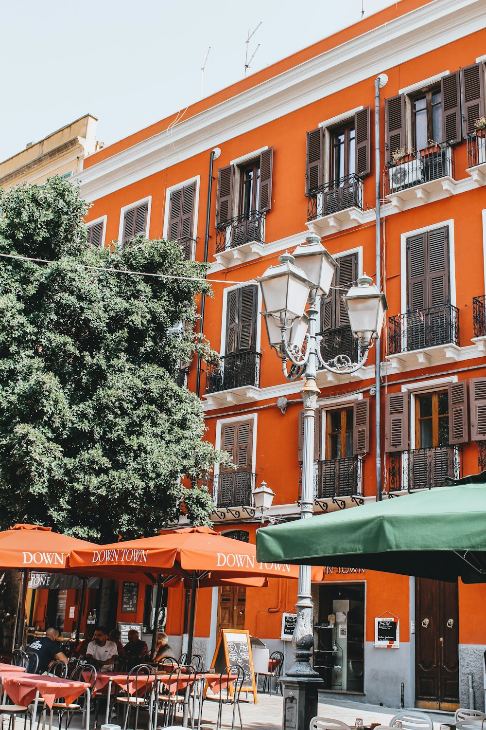 green and orange concrete building