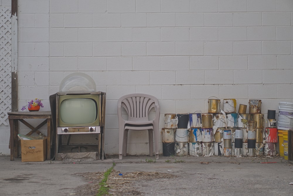 gray crt tv on gray concrete floor