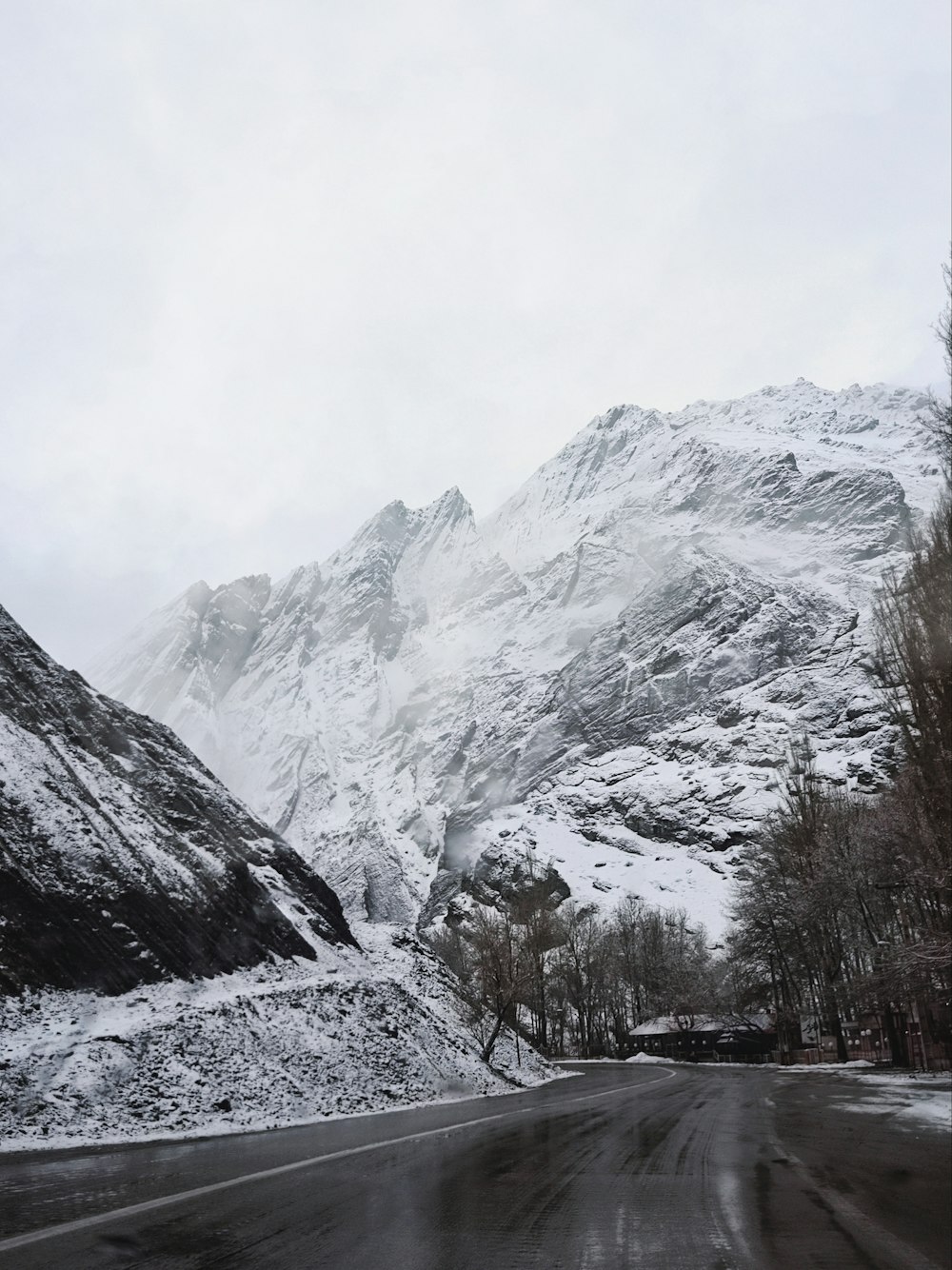 snow covered mountain during daytime