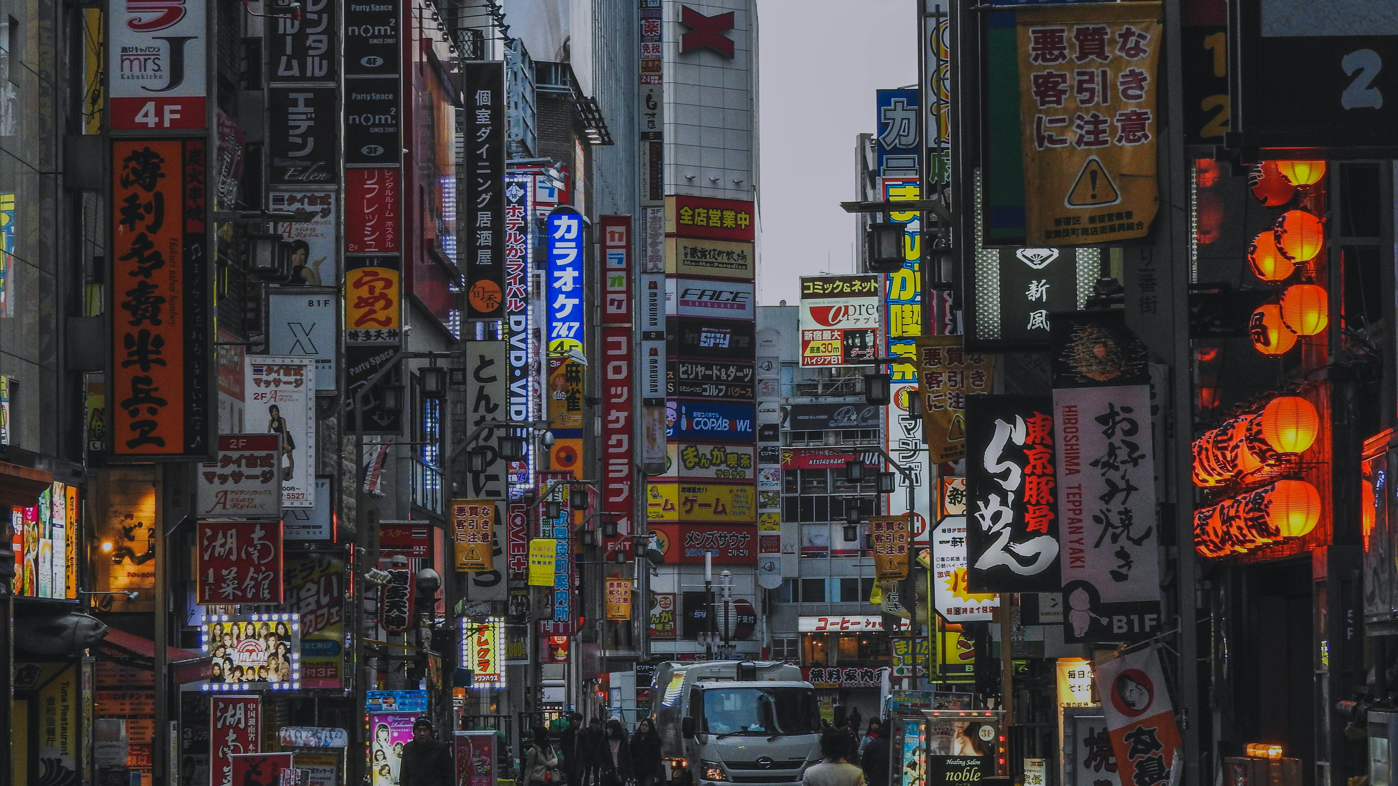 cars on road between high rise buildings during daytime, Famous Shinjuku Golden Gai, famous for its nightlife
