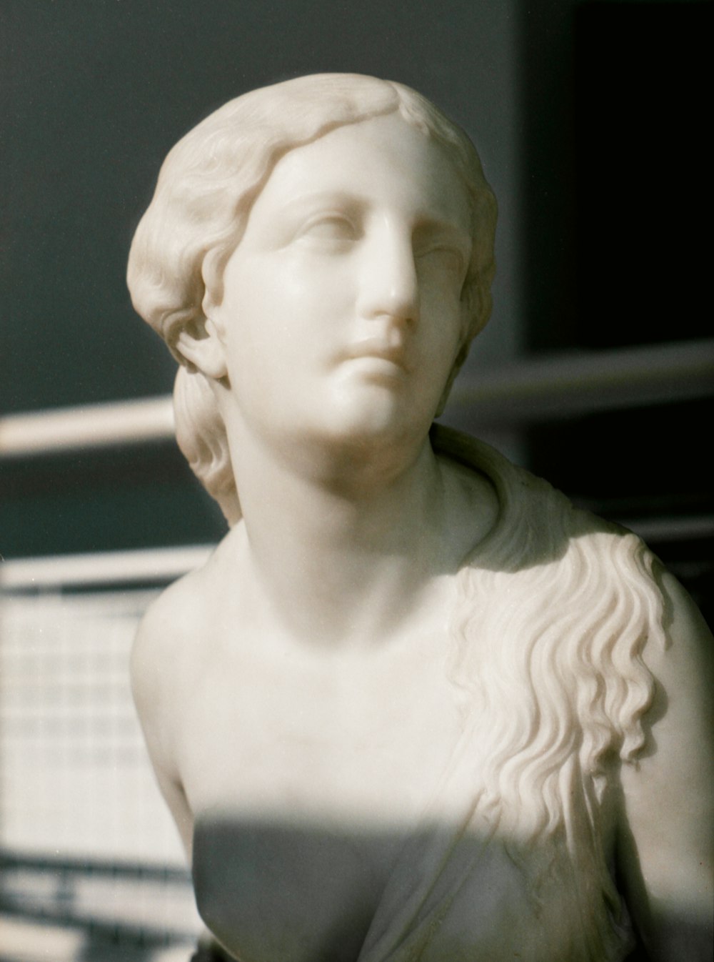 white ceramic bust of a woman