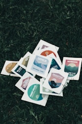 white red and green cards on green grass