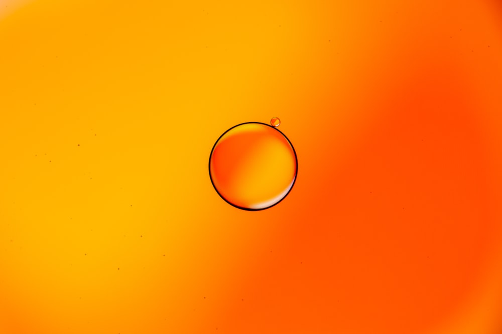 silver ring on blue background