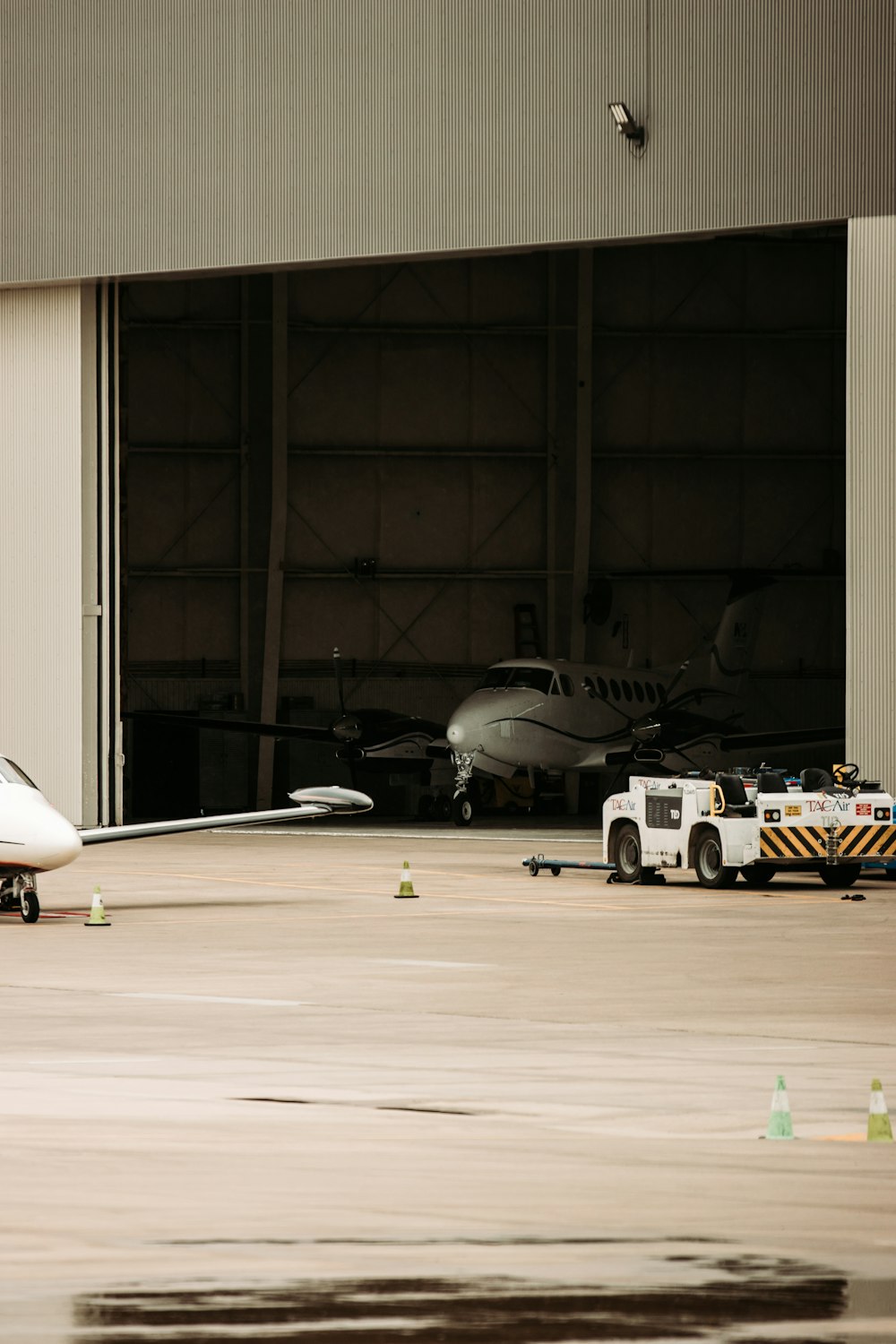 white airplane on a airport