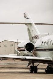 white and red passenger plane