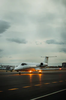 Regional turboprop and jet on an airport apron