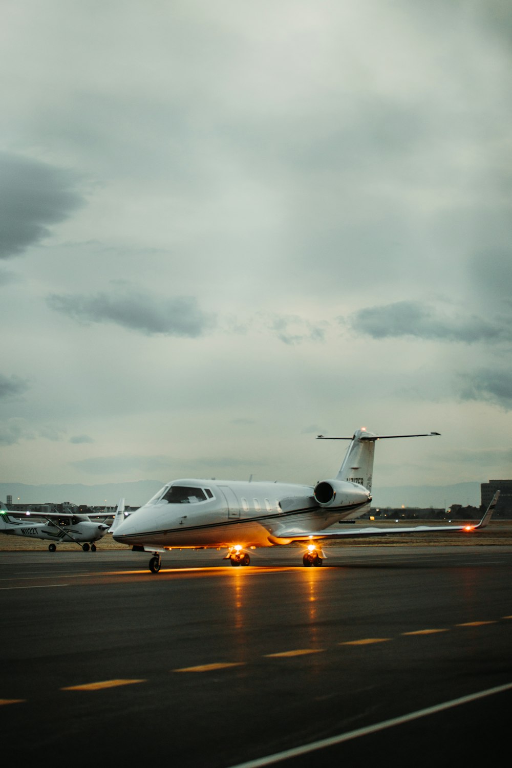 white airplane on the airport during daytime