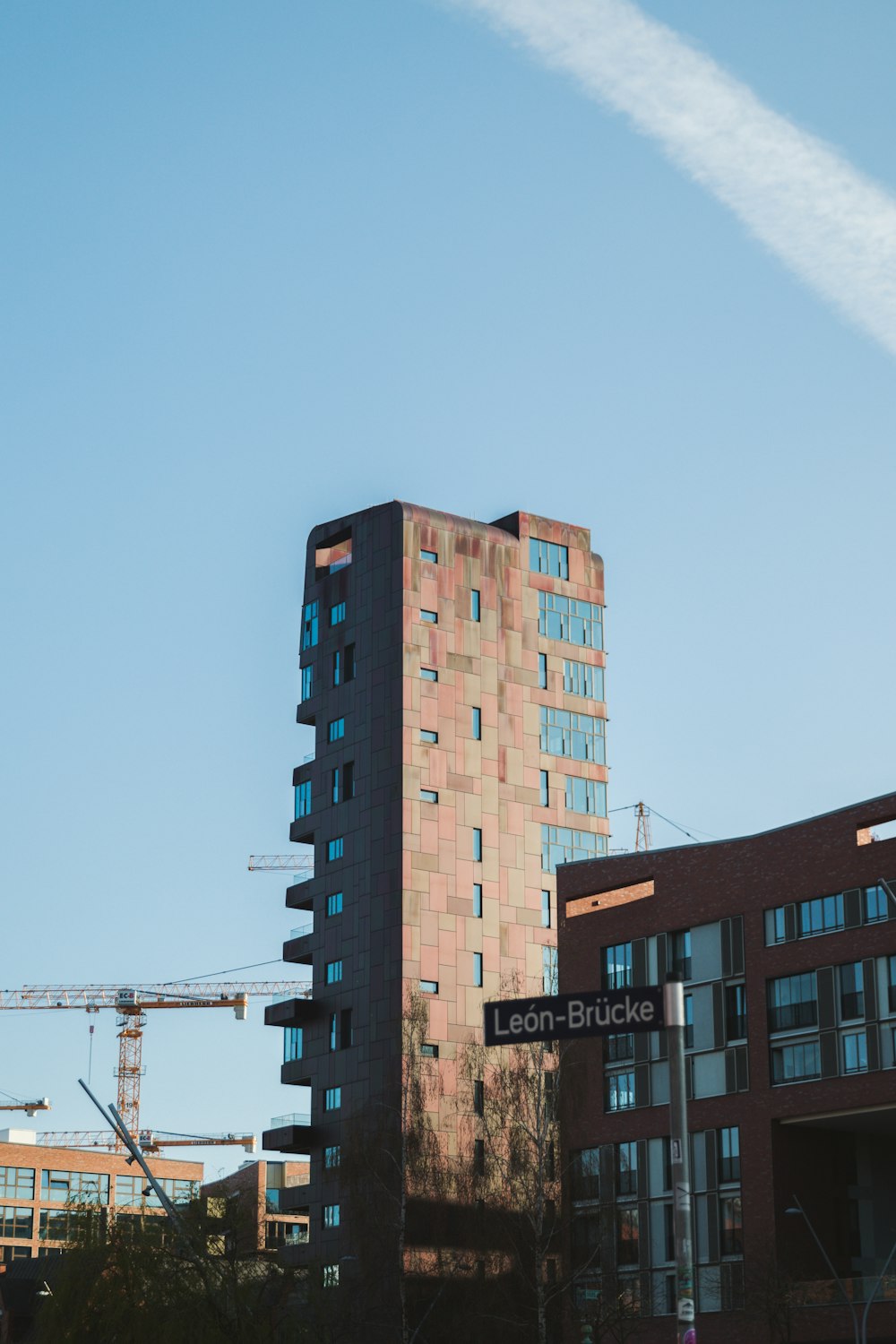 brown concrete building under white sky during daytime