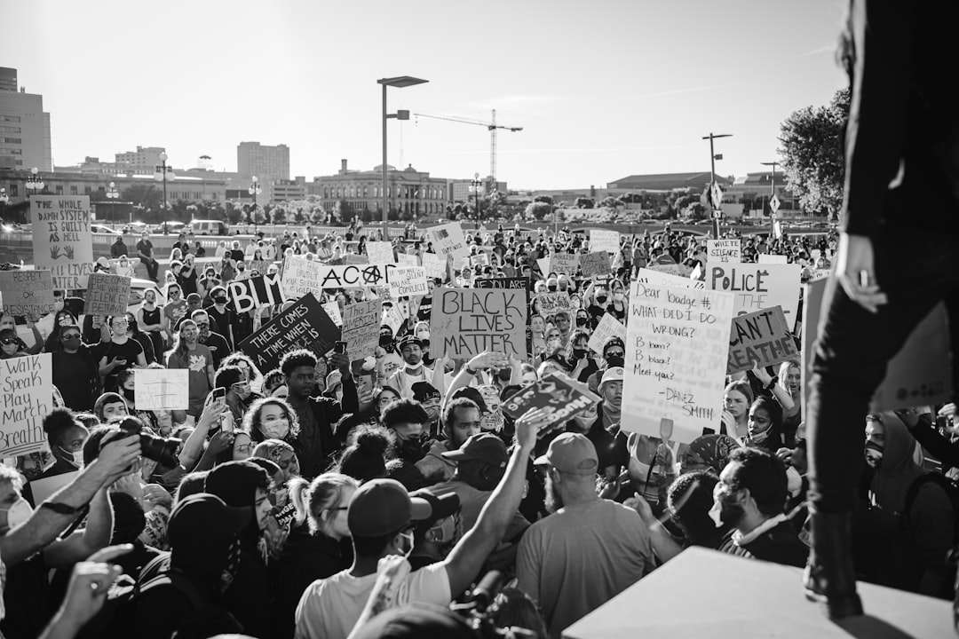 grayscale photo of people on street