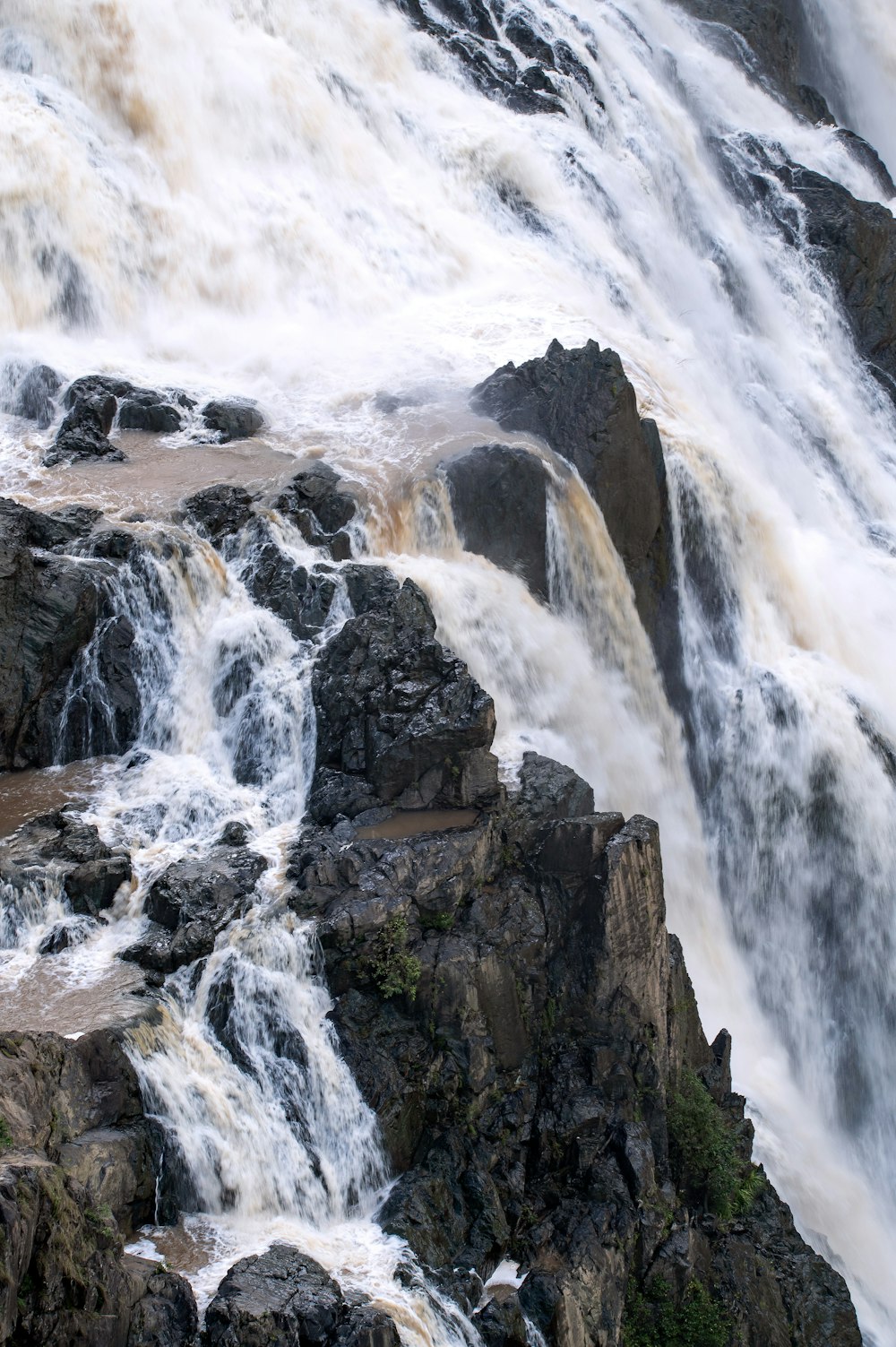 water falls on rocky mountain