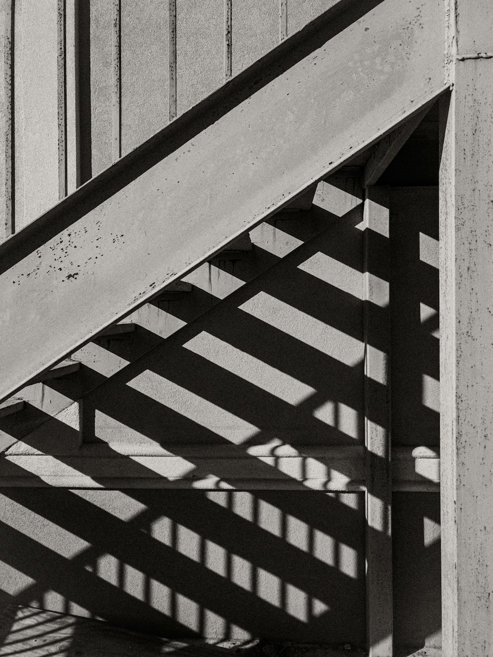 grayscale photo of metal railings