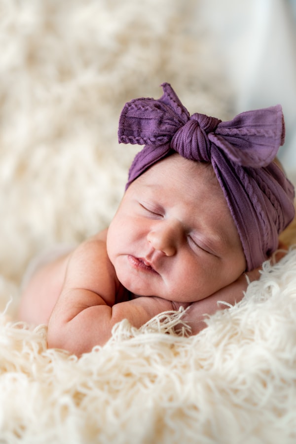 Newborn baby sleeping in a basket