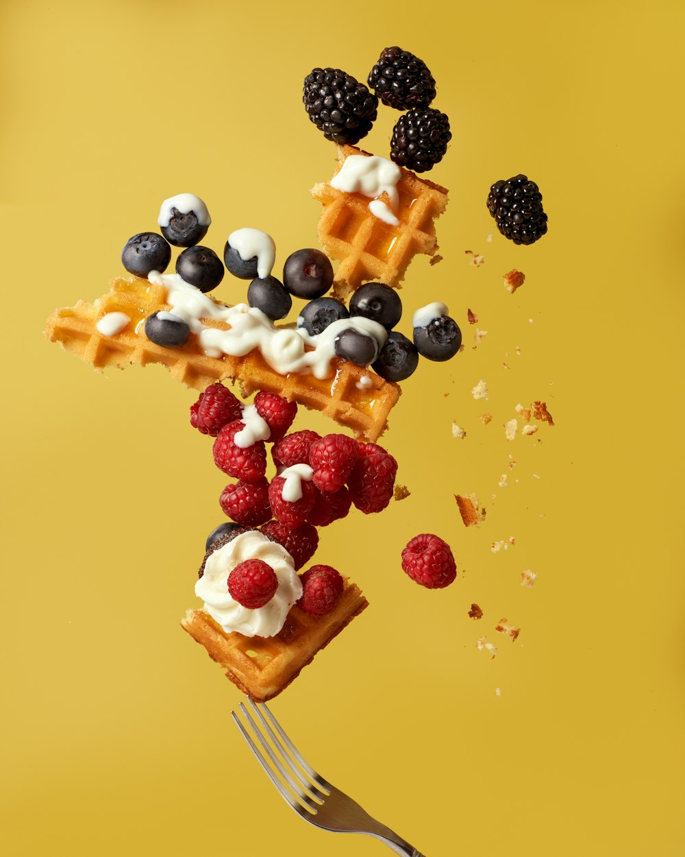 white and red fruit on brown wooden stick