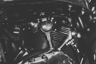 black and silver motorcycle engine