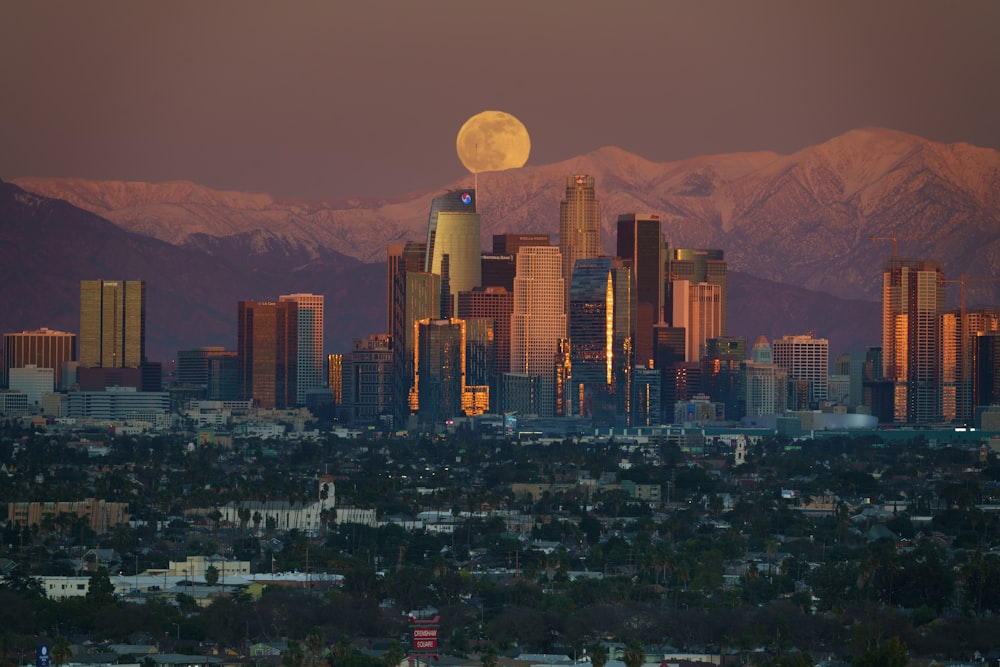 city skyline under full moon