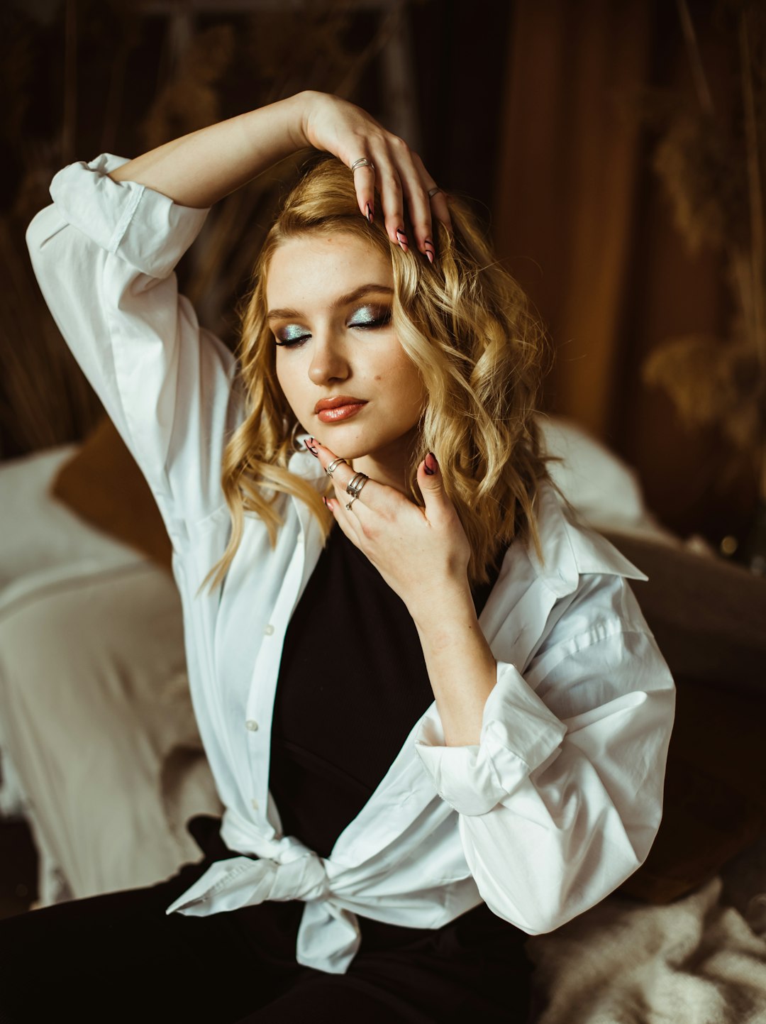 woman in white and black collared shirt