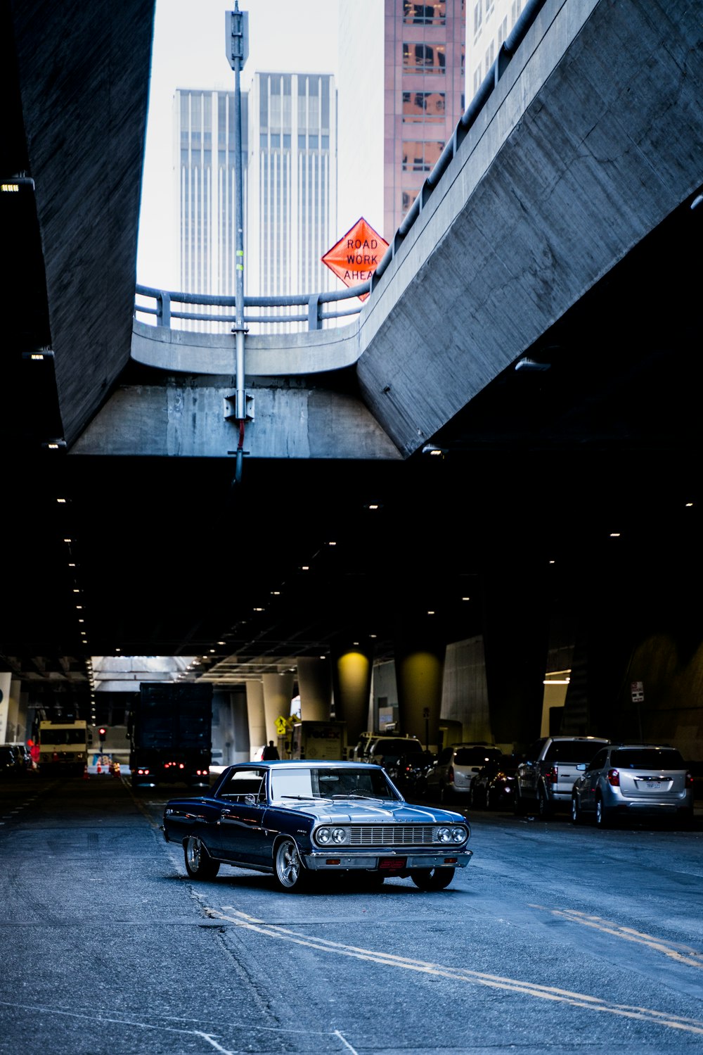 cars parked in front of building during night time