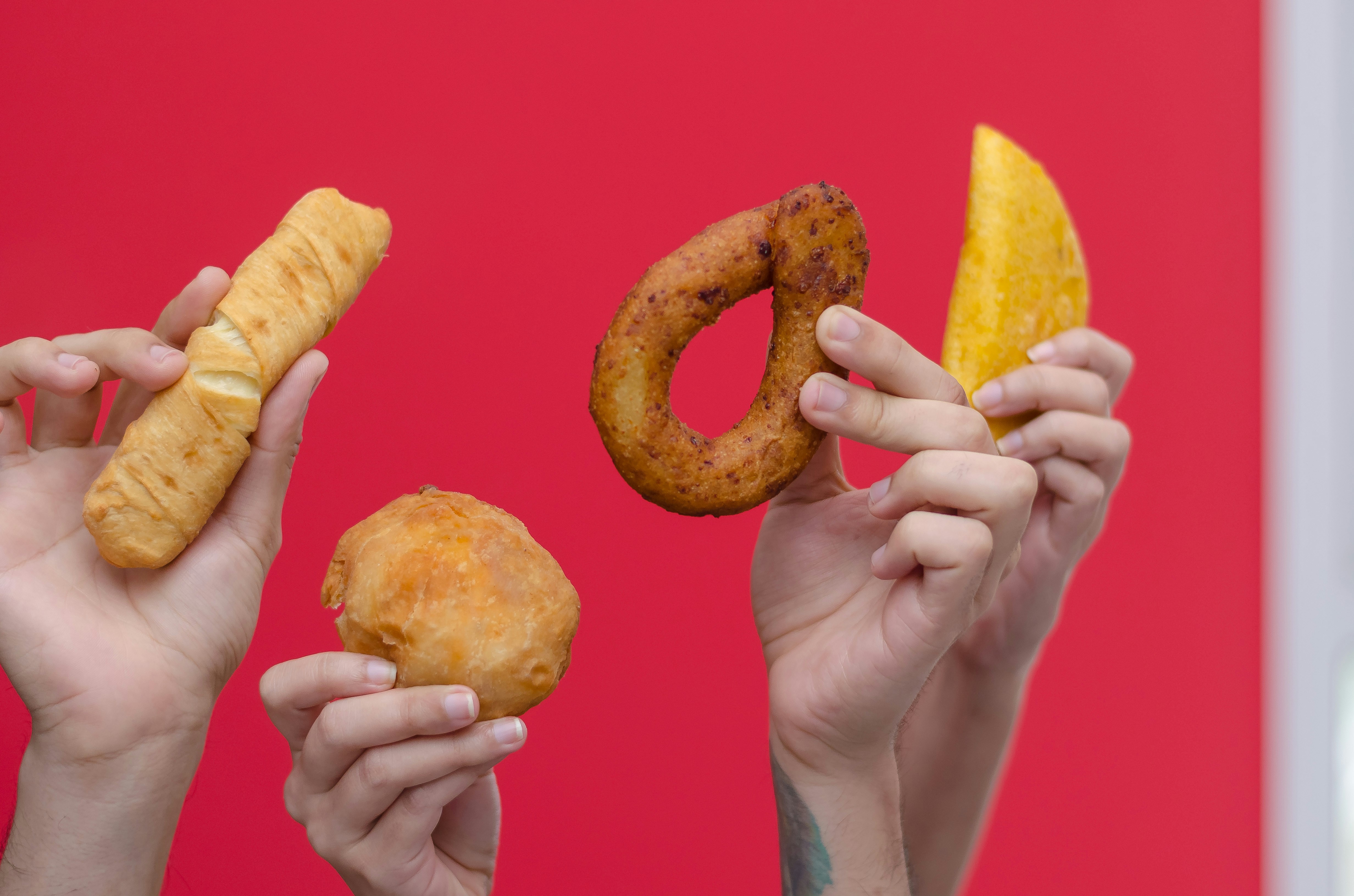 person holding brown bread with yellow sliced fruit, — Hello! My name is Frederick Medina, I