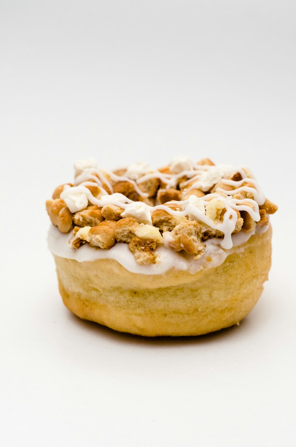 brown and white pastry on white surface