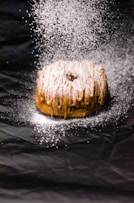 brown pastry on black textile