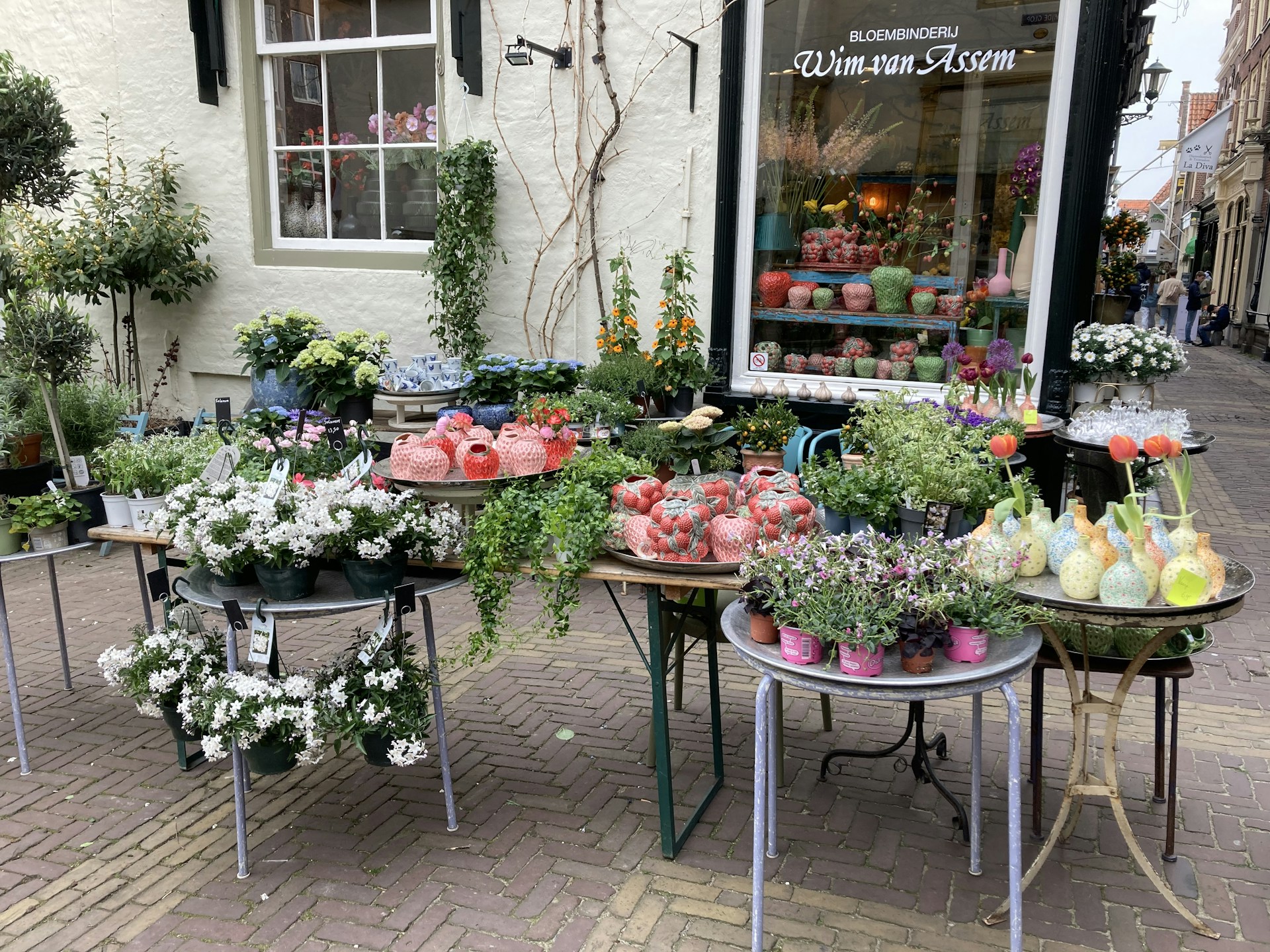 woman wearing yellow long-sleeved dress under white clouds and blue sky during daytime