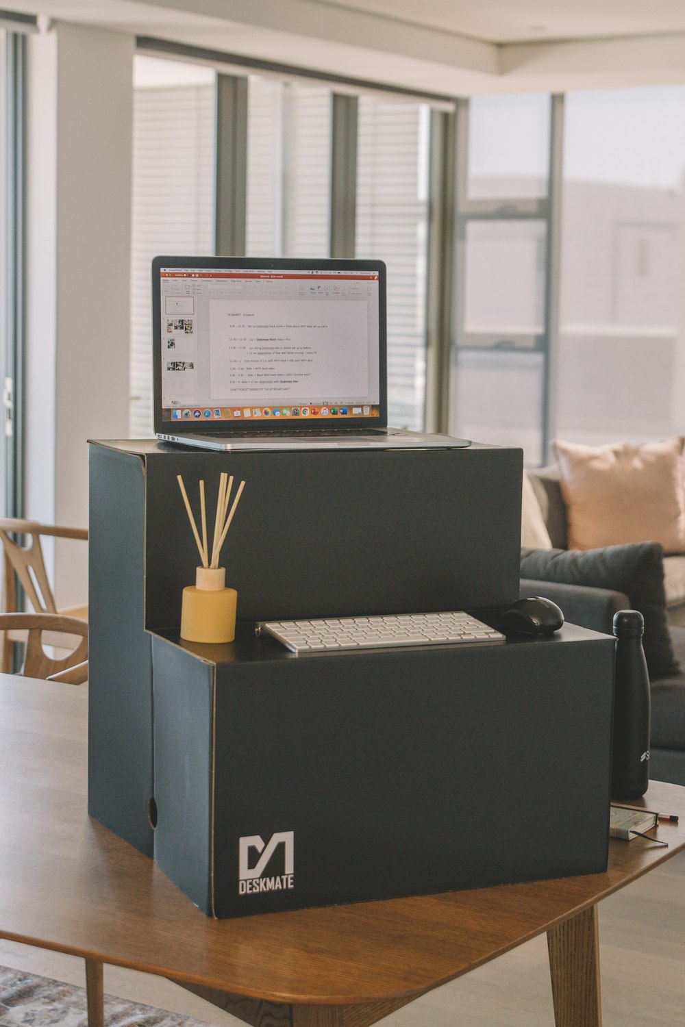 black flat screen computer monitor on black wooden desk