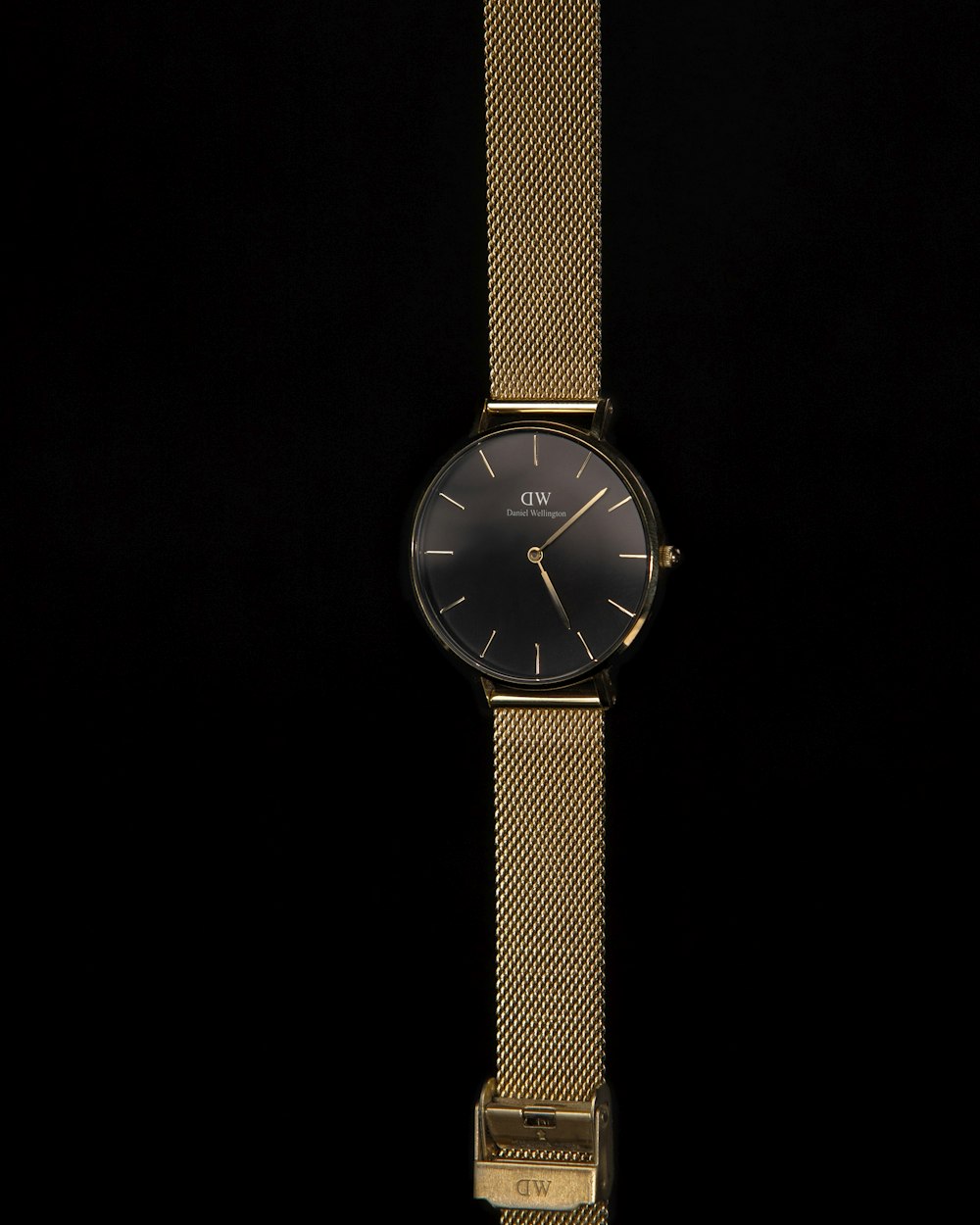 gold and silver round analog watch