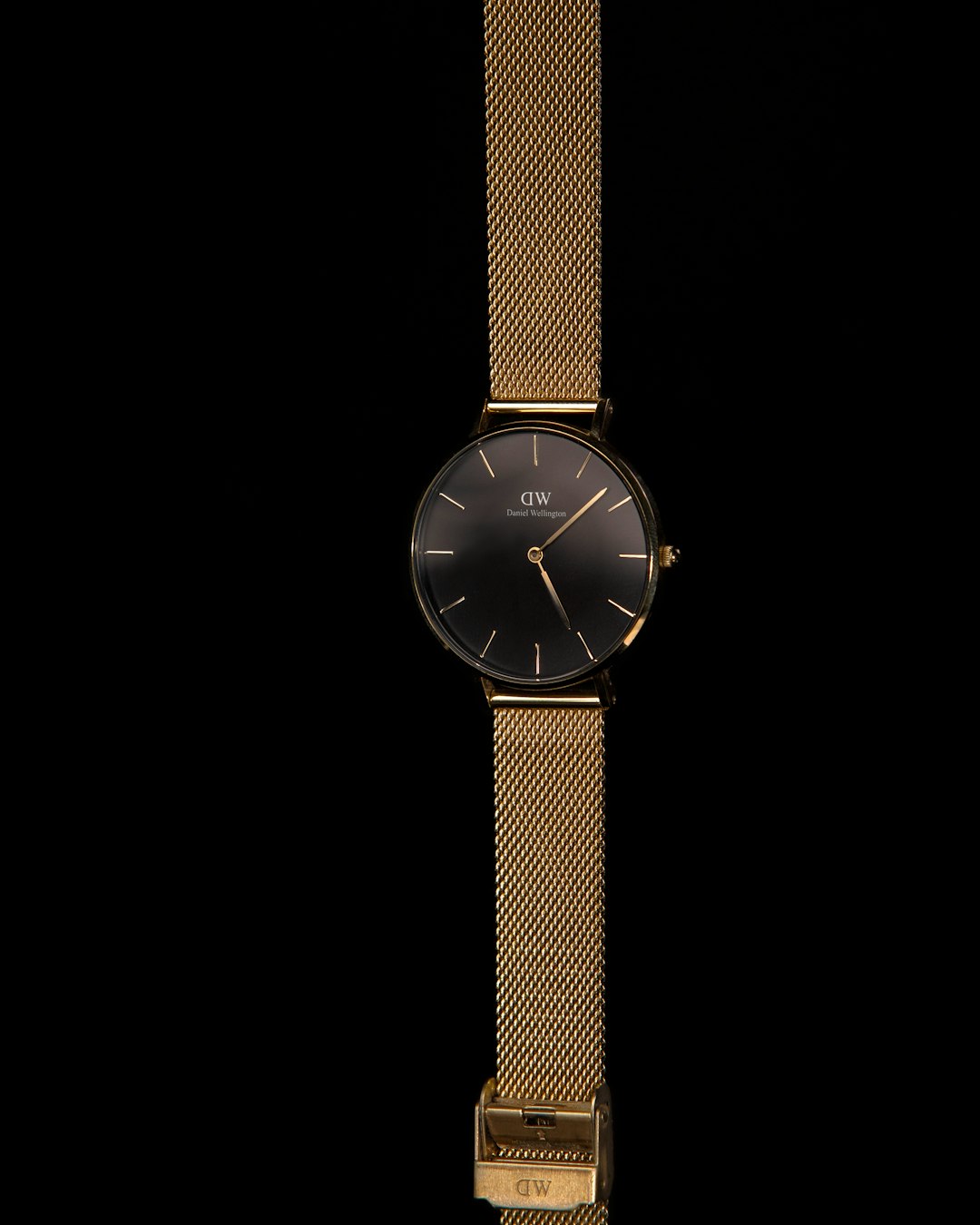 gold and silver round analog watch