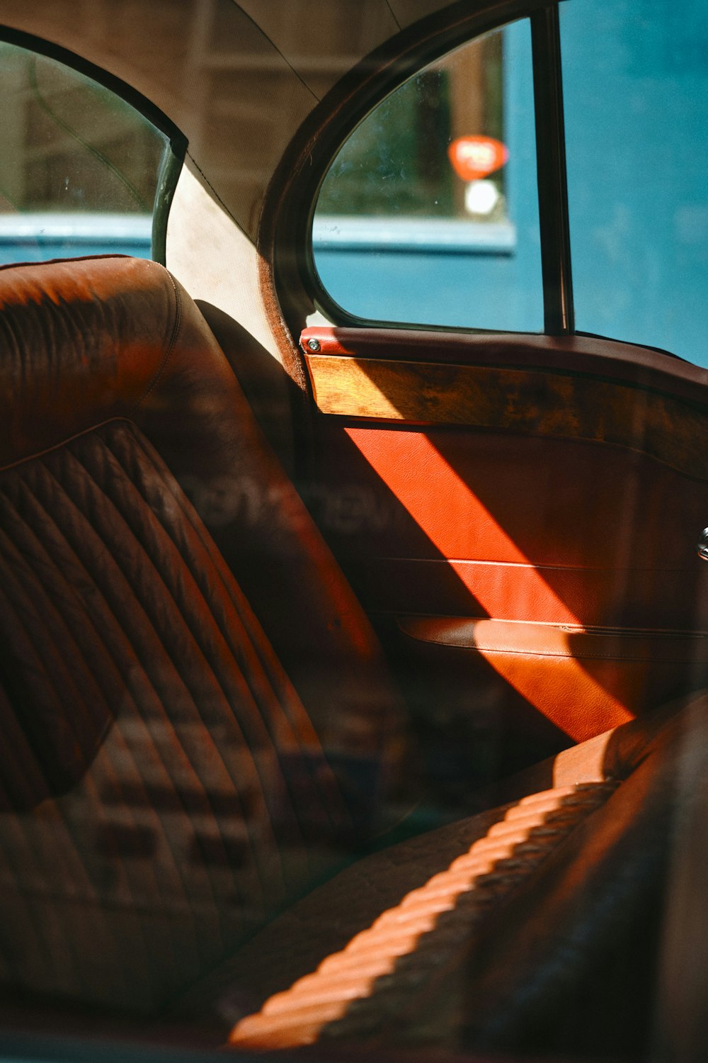 brown and black leather vehicle seat