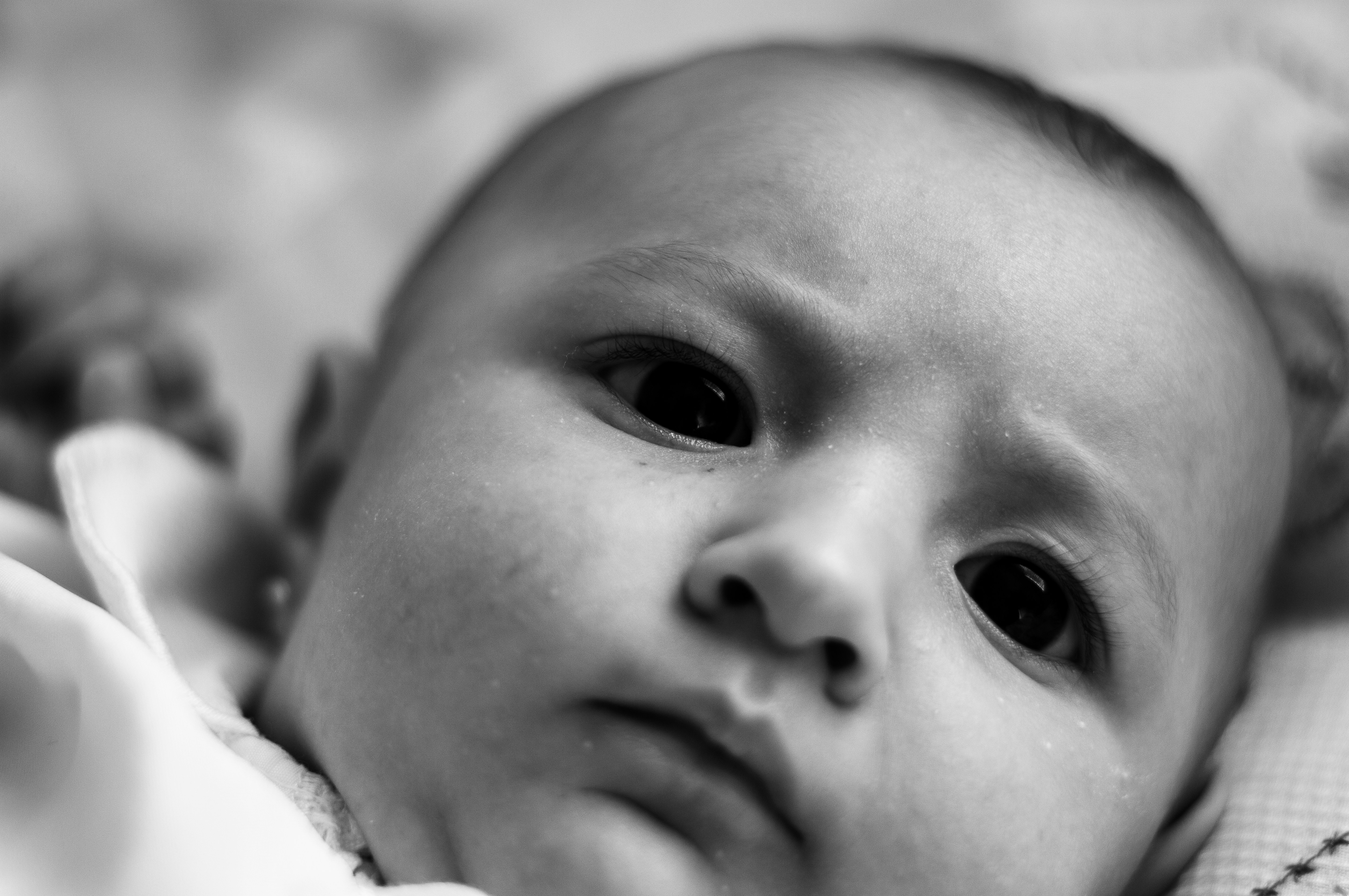 grayscale photo of babys face