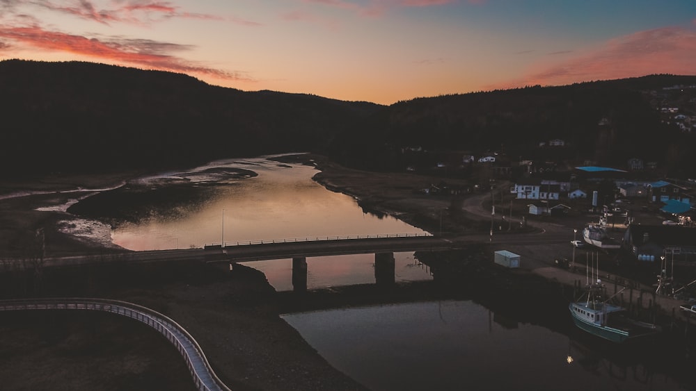 bridge over river during night time