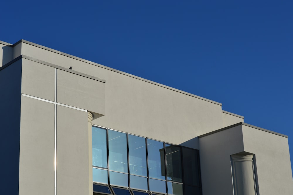 white concrete building under blue sky during daytime