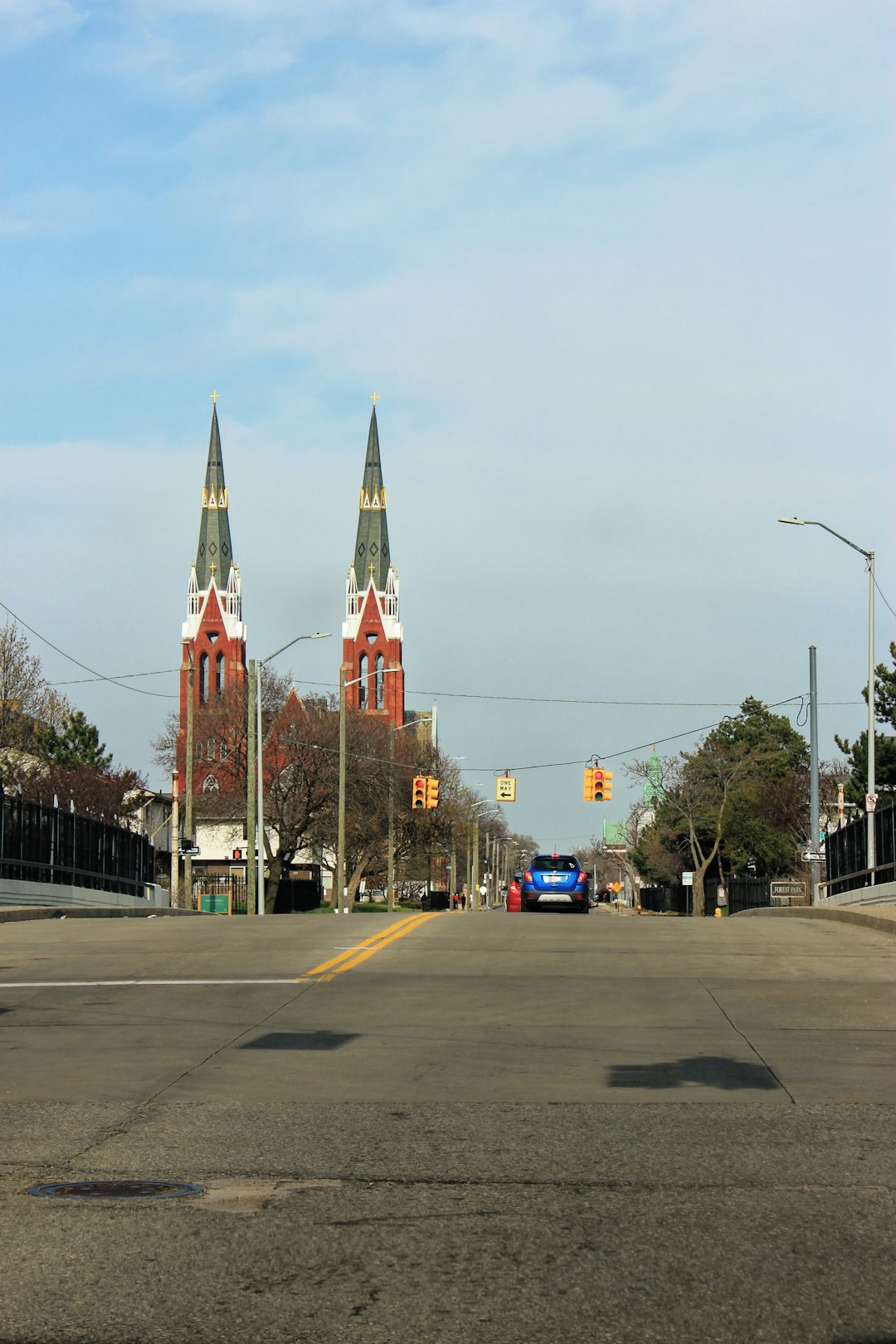 red and yellow traffic light on gray asphalt road during daytime