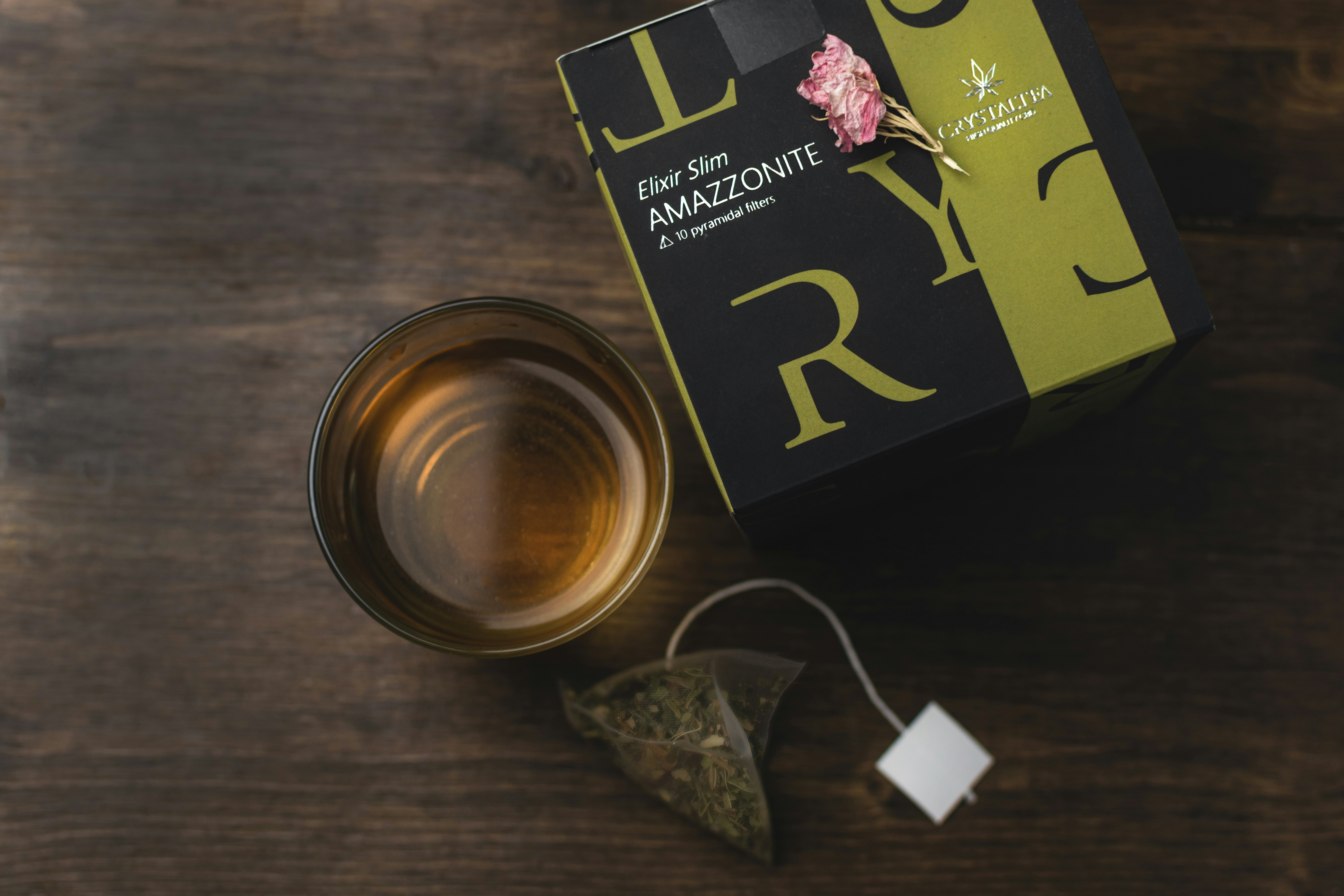 green and black labeled box