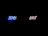 Neon lights displaying the words 'BOYS' in blue and 'GIRLS' in pink against a dark background.