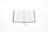 An open book with text on both pages, featuring ornate blue borders. The book is placed on a white background, and a blue bookmark is visible.