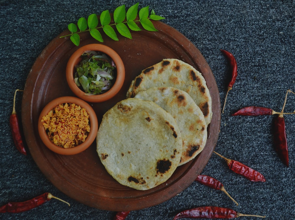 brown round plate with food