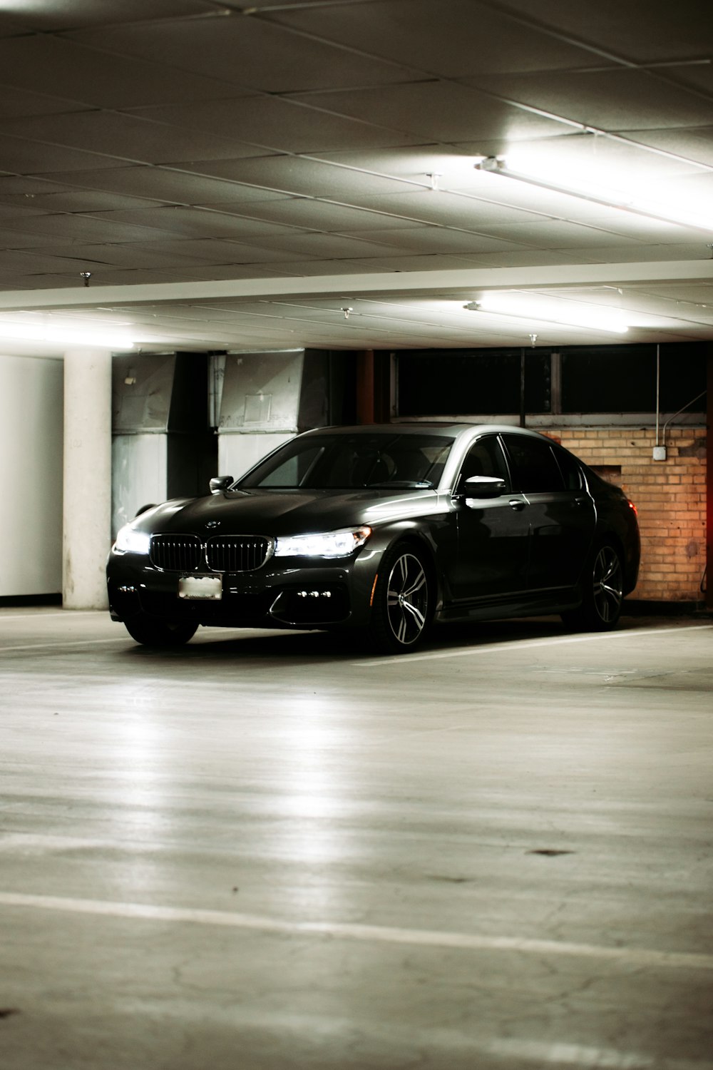 black mercedes benz coupe on parking lot