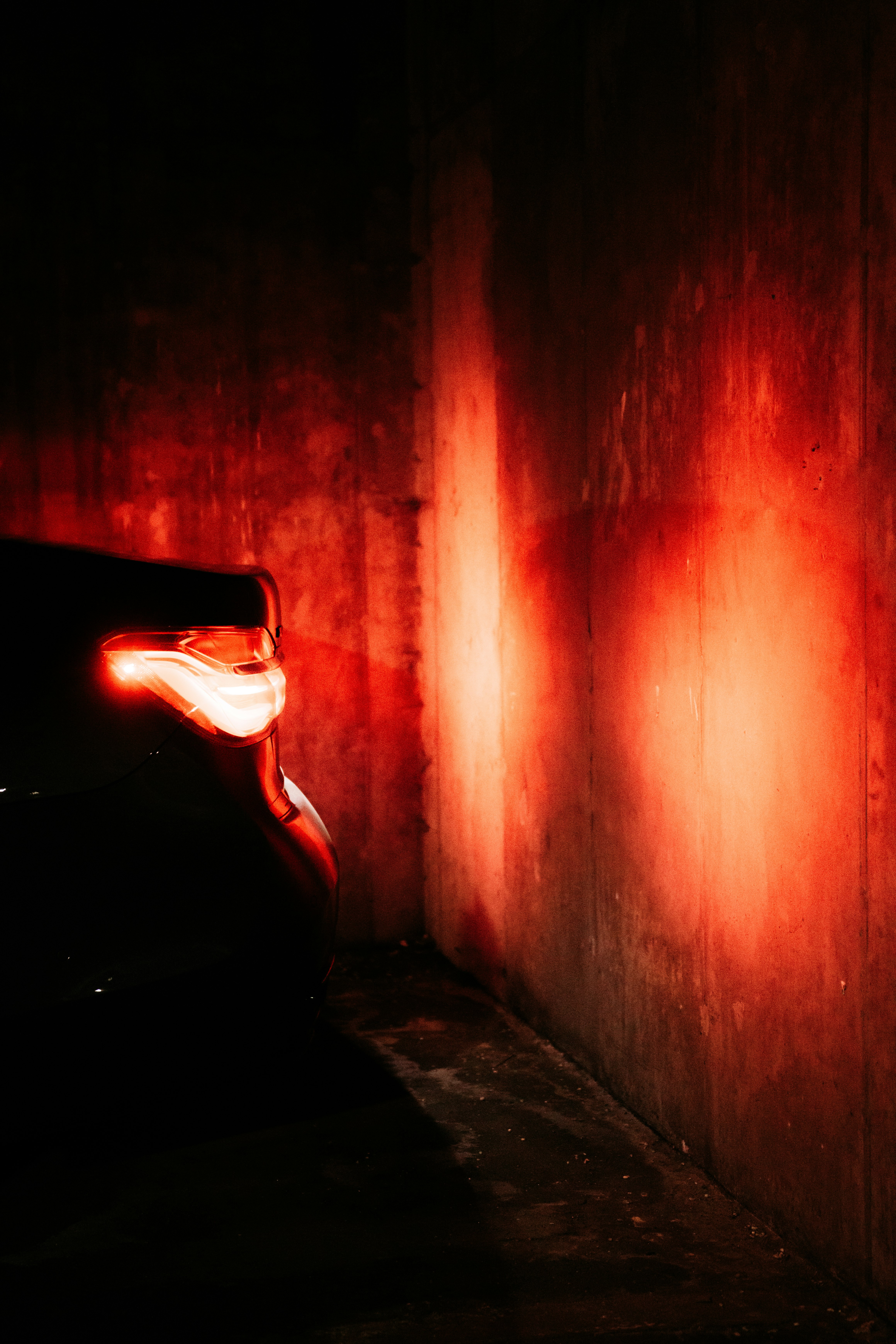 red light in a dark tunnel