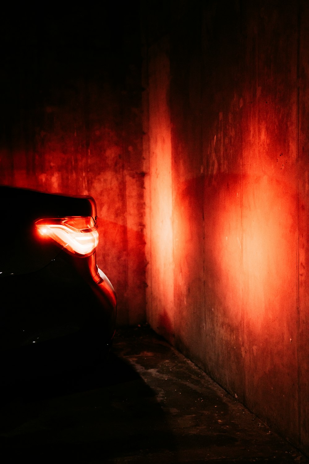 red light in a dark tunnel