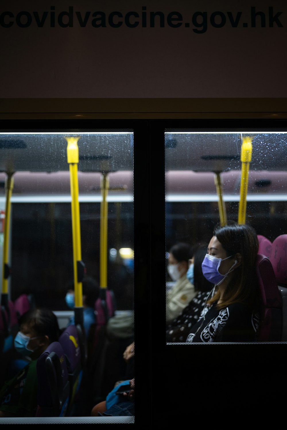 people sitting on train during daytime