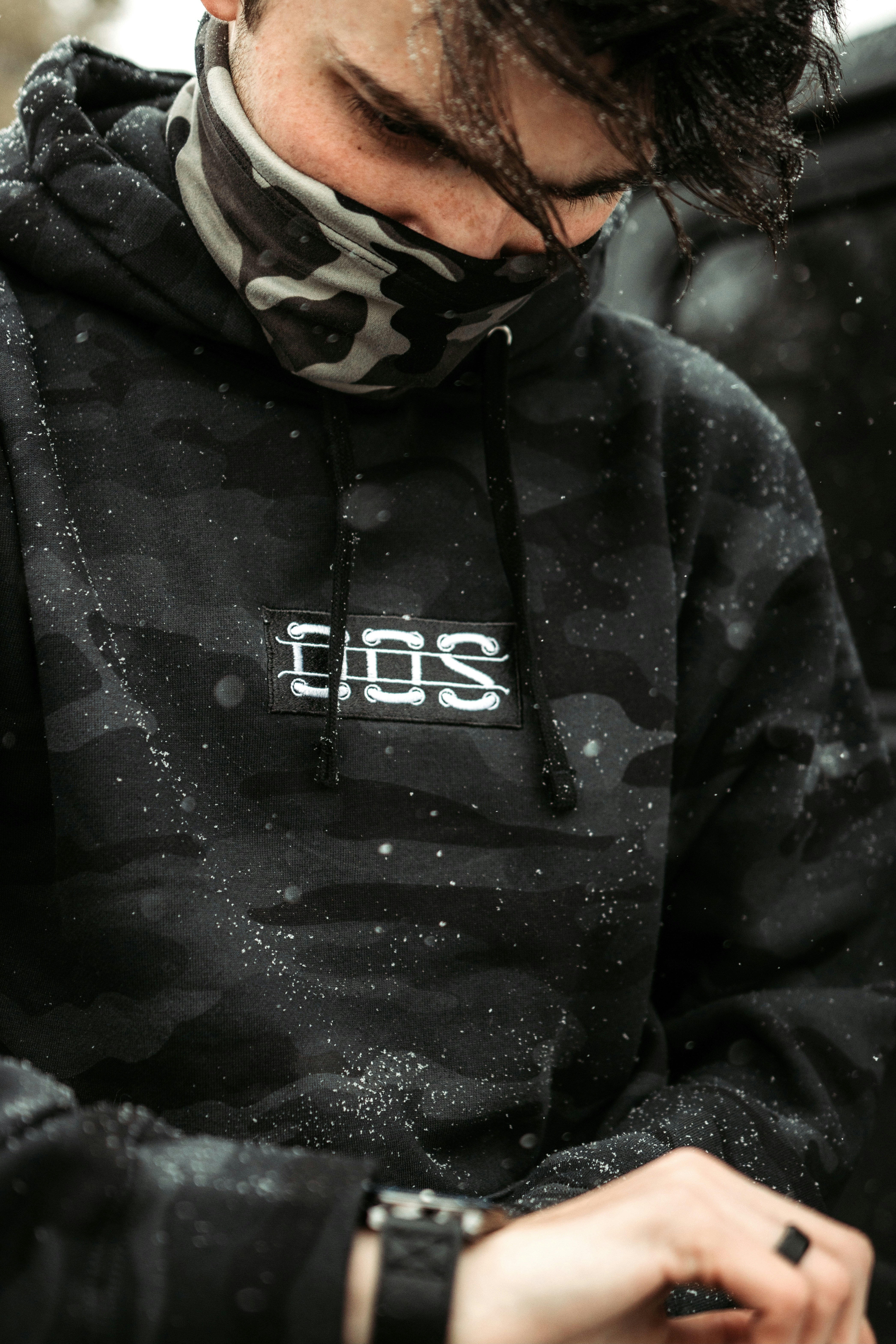 man in black and white the north face jacket