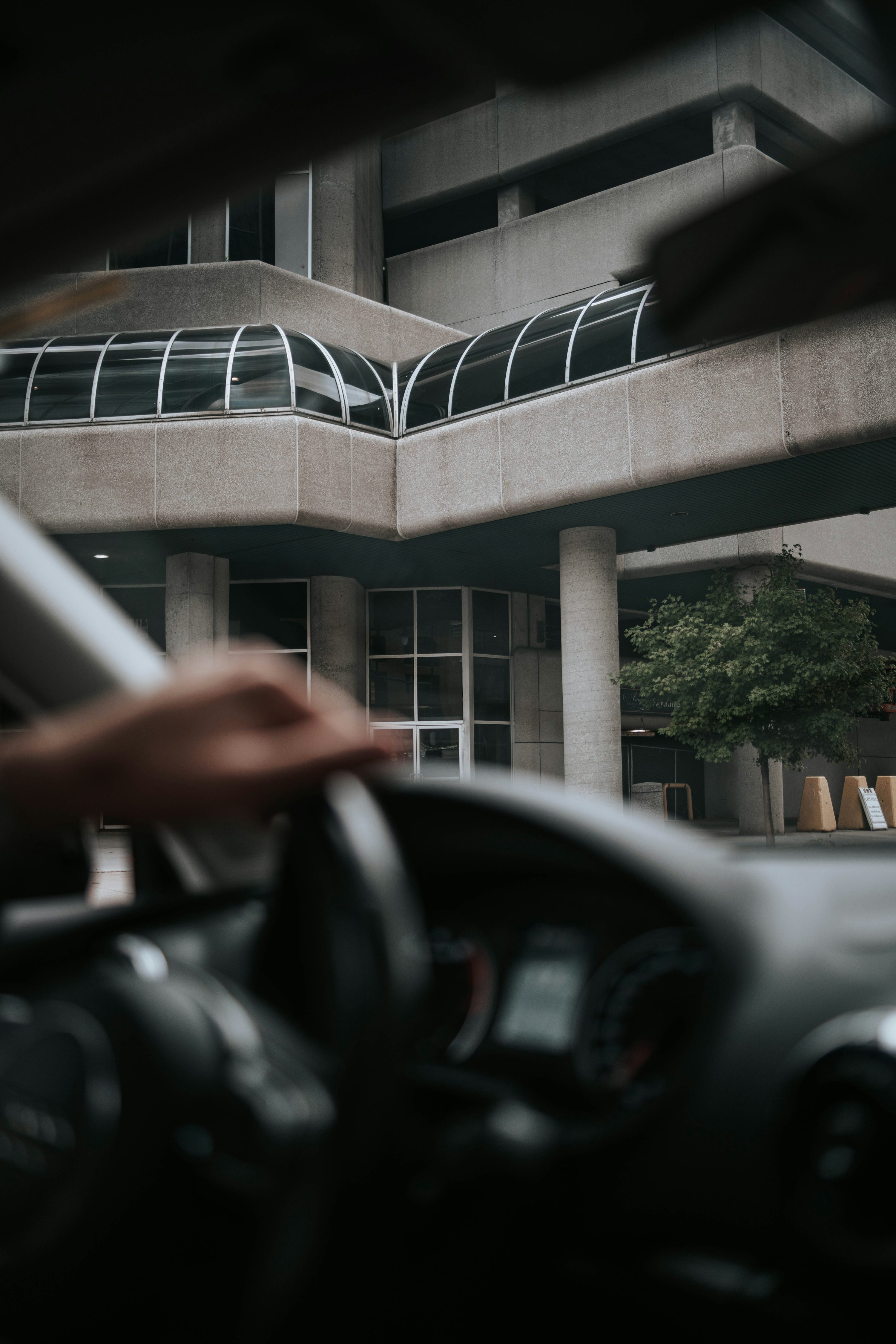 person in black jacket driving car