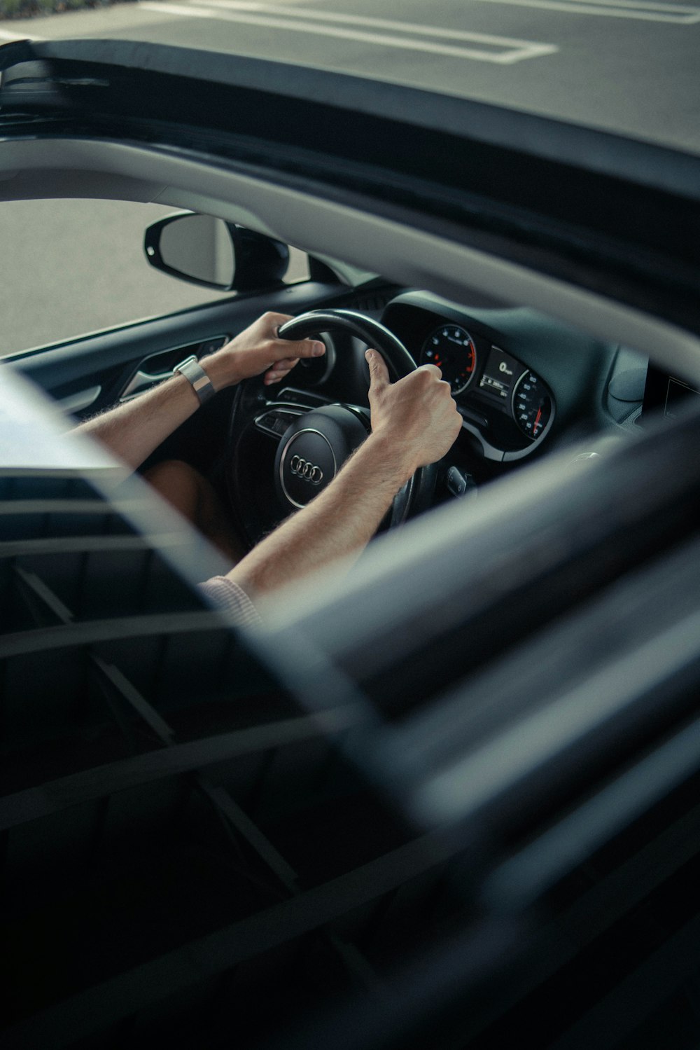 person driving car during daytime