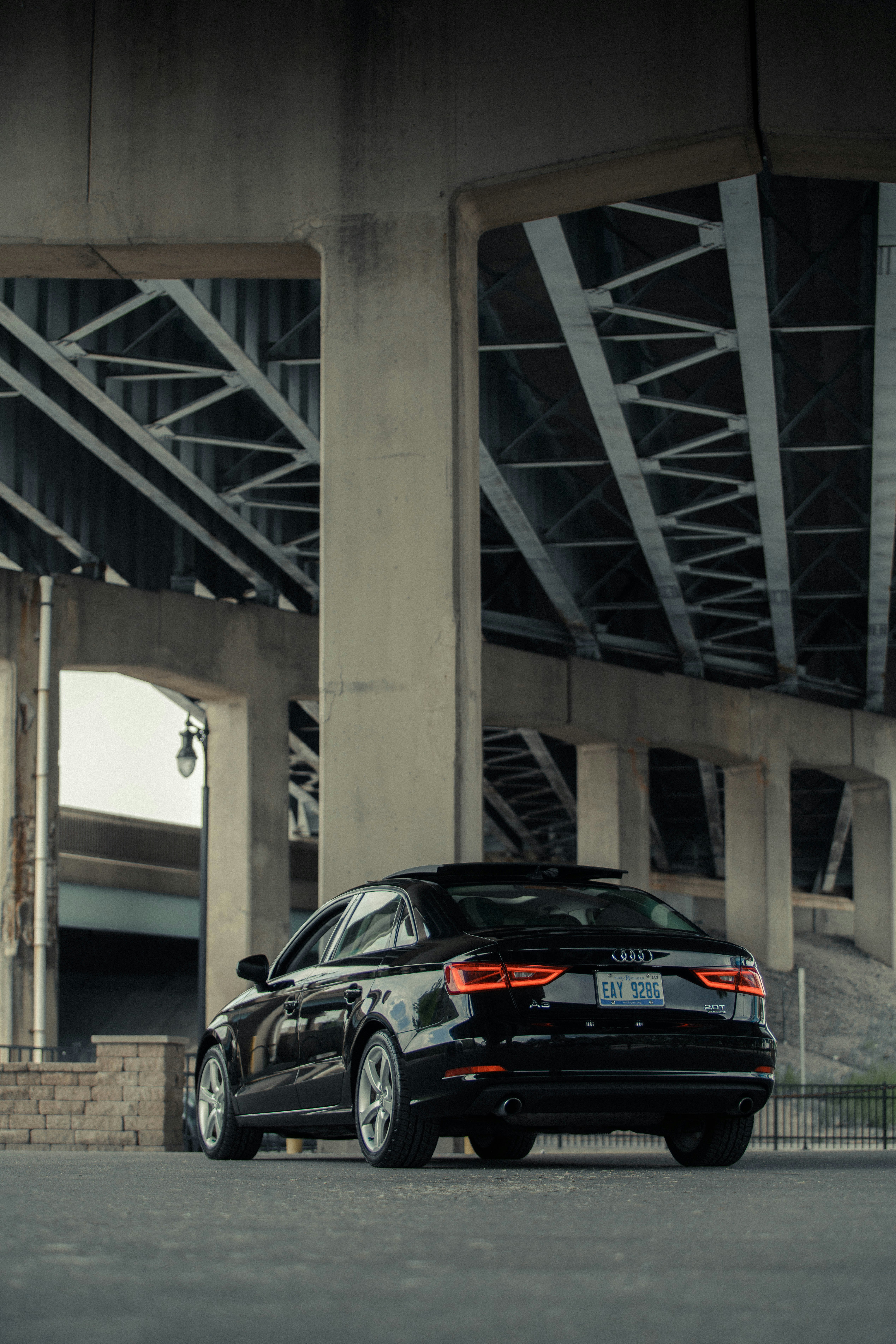 black bmw m 3 coupe parked on gray concrete road during daytime