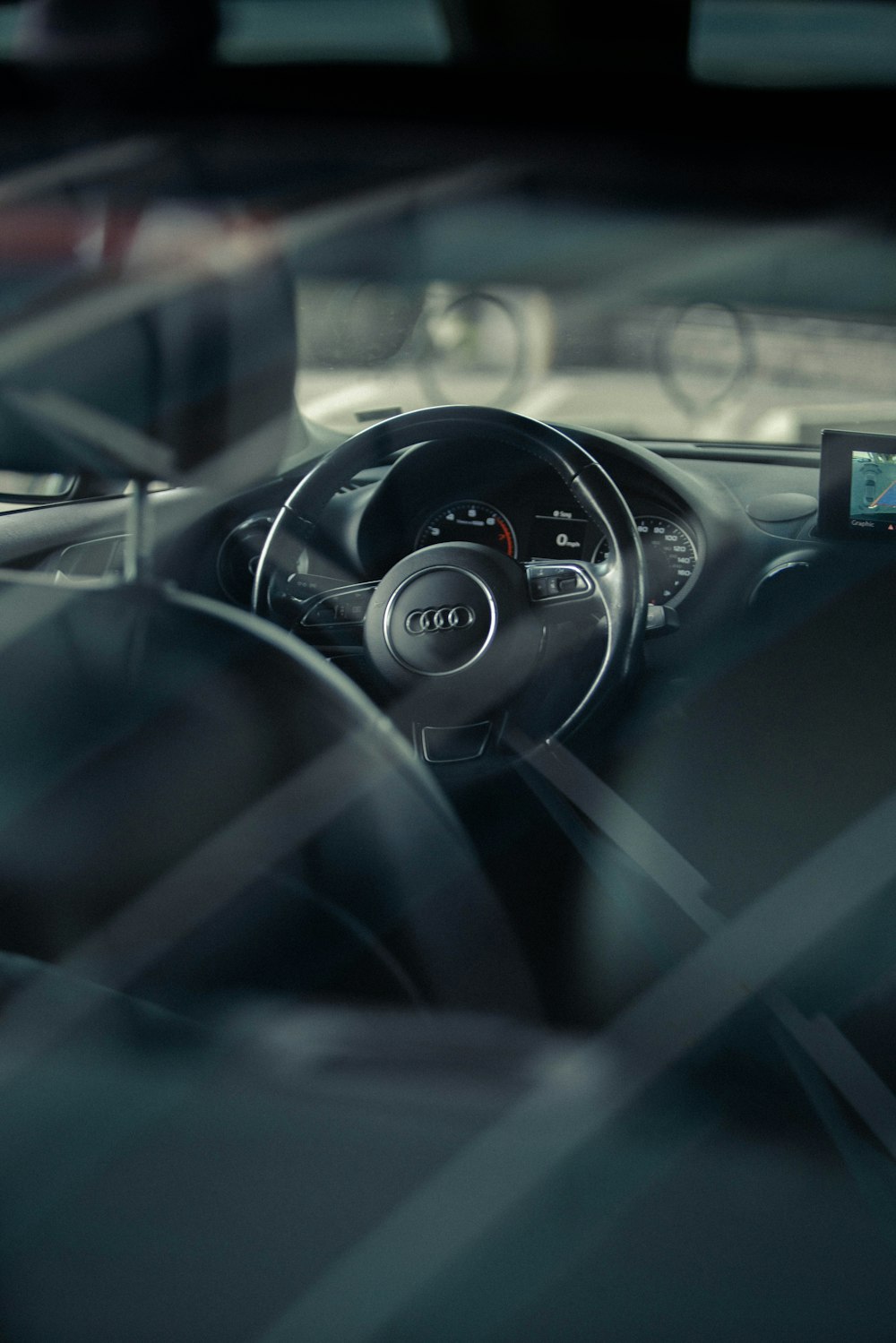 black and silver steering wheel