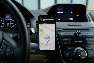 black android smartphone on car center console