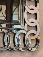 Elegant handcrafted mirror with a subtle photo integration detail.