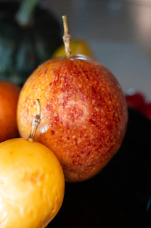 A close-up of colorful fruit ready to be blended.