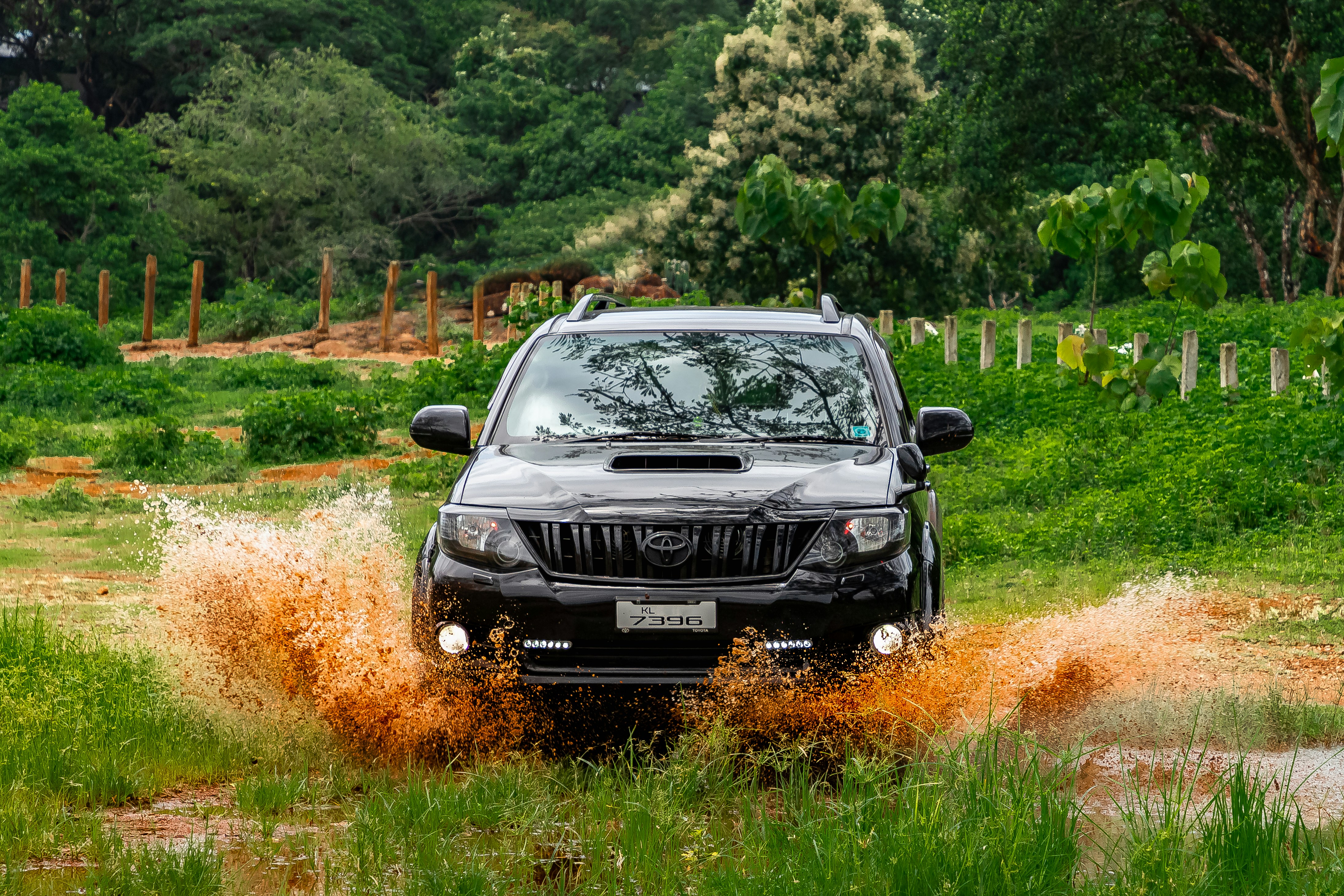 black jeep suv on brown grass field during daytime
